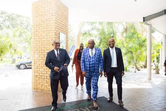 Dr. Matome walking with colleagues