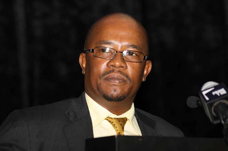 Dr. Matome speaking at a podium